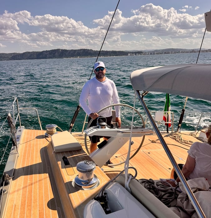 Erik at the helm of the GS 72 Plus Long Cruise